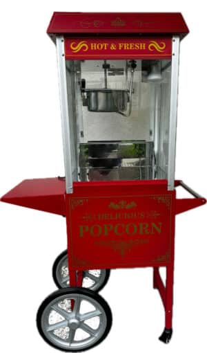 Rote Popcornmaschine mit Wagen, beschriftet mit "Hot & Fresh" und "Delicious Popcorn", im klassischen Design